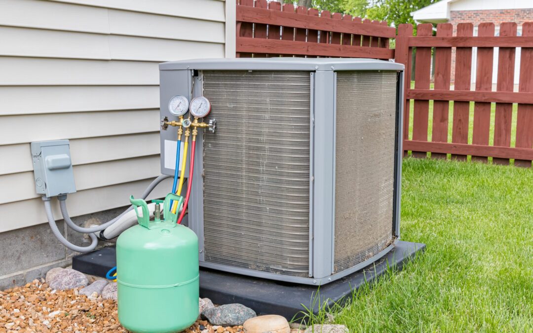 An outdoor air conditioning unit in need of DIY maintenance installed beside a home in Dallas