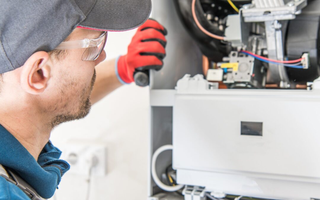 An HVAC technician performing a furnace tune-up in Dallas